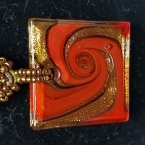Red and gold swirl Merano glass pendant suede chain w/ Lobster clasp  20" ✨